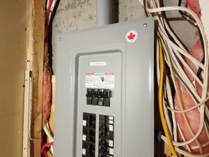 Augmentation de la capacité de l'entrée électrique à 200A et remplacement du panneau électrique.