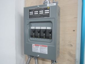 Travaux divers tels que remplacement du panneau électrique , installation de chauffage, éclairage et prises de courant.