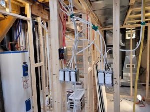 Travaux divers tels que remplacement du panneau électrique , installation de chauffage, éclairage et prises de courant.